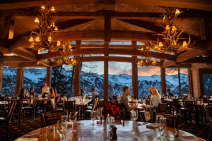 Allred's Restaurant's magnificent fine dining room with views of majestic peaks through the floor to ceiling windows. 